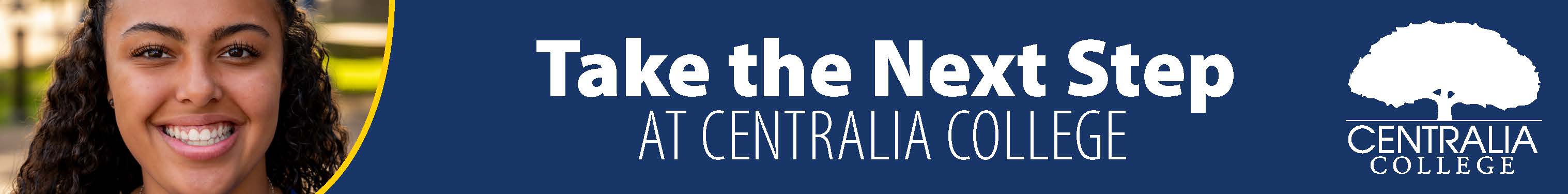 A smiling Centralia College student on campus with a blue banner that says "Take the next step at Centralia College" in white letters